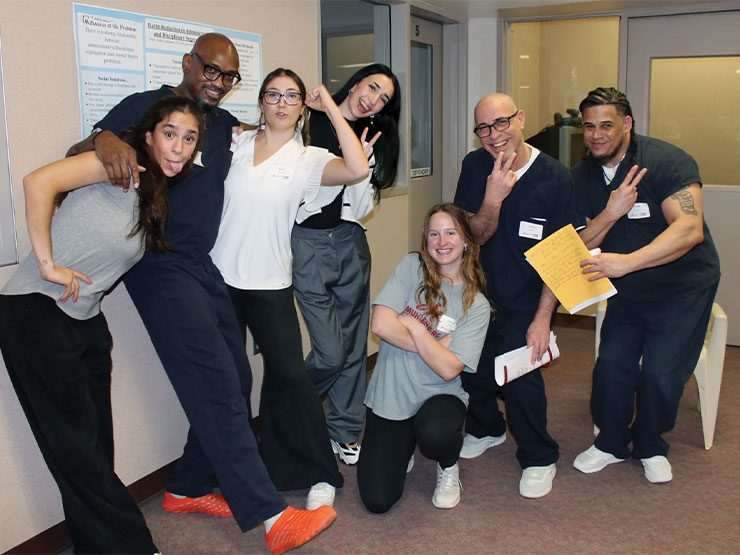 College students and inmate students pose for a photo at the Lehigh County Jail.