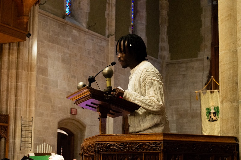 Mohsin standing on pulpit as speaker