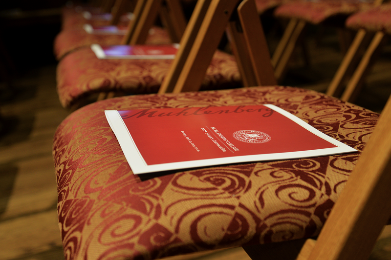 programs for the event on a chair